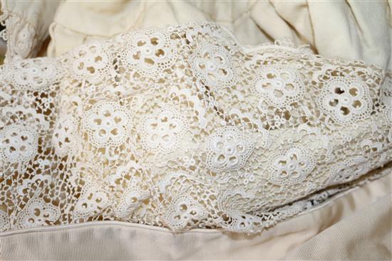 Two ornate babys 19th century christening capes, a silk and lace wedding train, waxed headdress and veil